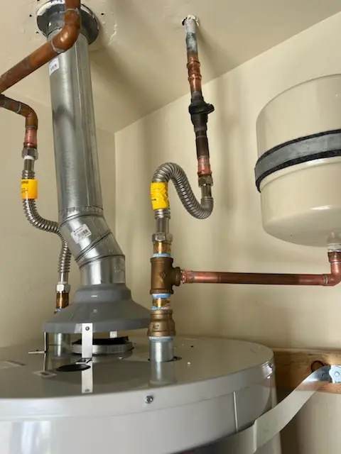 Water heater installation and plumbing repair in Inwood